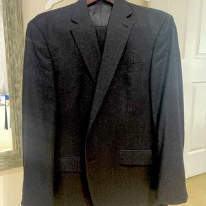Ralph Lauren, 100% Wool Suit Size 43R. Inseam 30” expandable to 36”. No defects